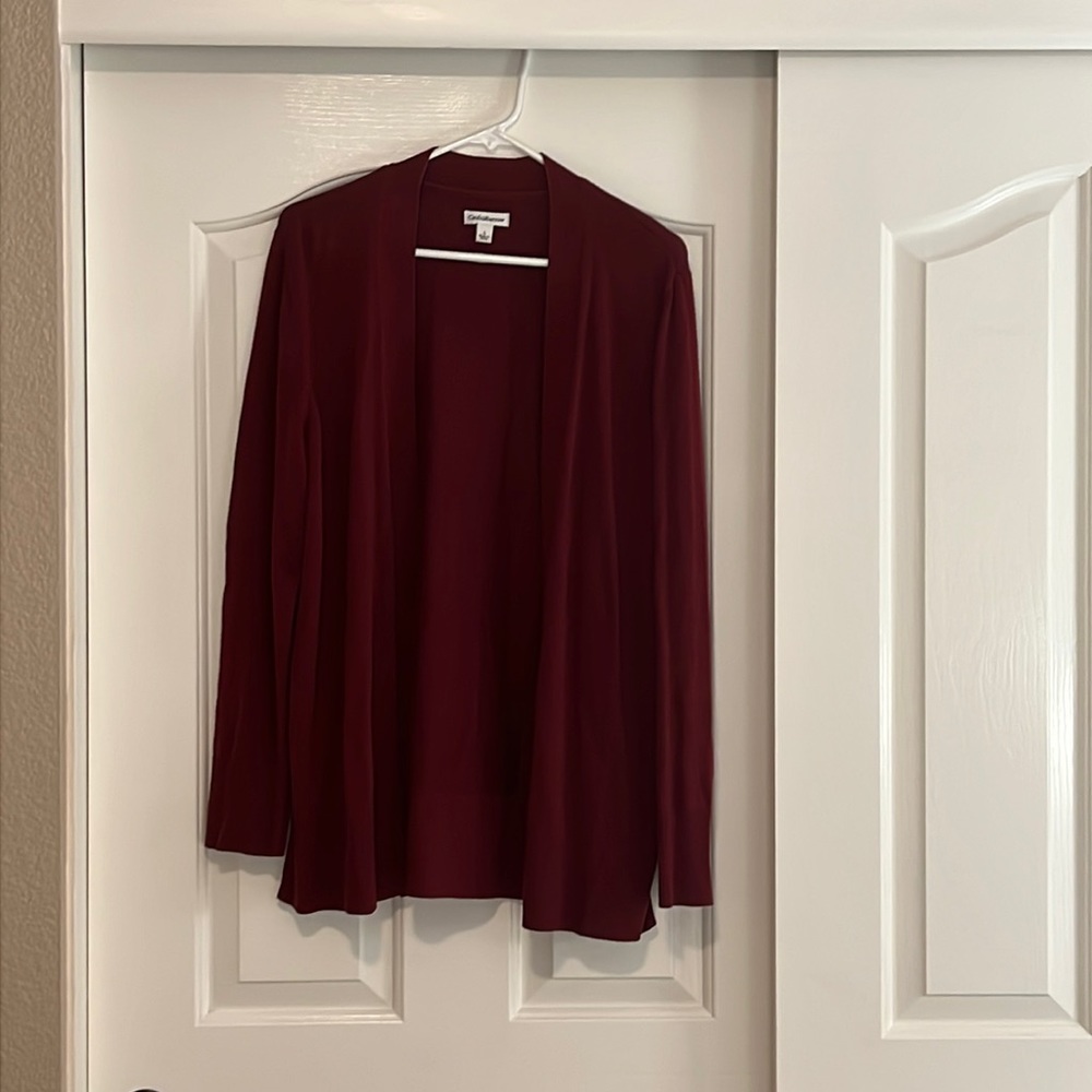 Beautiful maroon cardigan. Size L. Long sleeved with slits in the back bottom.